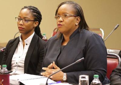 Tricia Hudlin-Cooper, assistant Director of Public Prosecutions, responds to a question during the Joint Select Committee on Finance and Legal Affairs at the International Waterfront Centre, Port of Spain, yesterday.