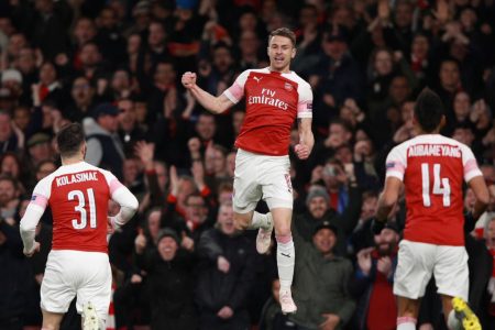 Arsenal’s Aaron Ramsey celebrates scoring their first goal with Sead Kolasinac and Pierre-Emerick Aubameyang yesterday. REUTERS/Ian Walton
