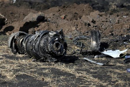 Engine parts are seen at the scene of the Ethiopian Airlines Flight ET 302 plane crash, near the town of Bishoftu, southeast of Addis Ababa, Ethiopia on March 11th, 2019. (REUTERS/Tiksa Negeri/File Photo)
