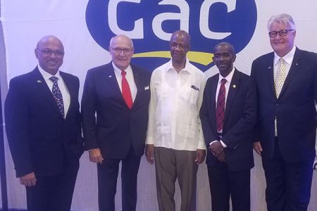 Left: Managing Director of GAC Trinidad & Tobago Gobind Kukreja, Executive Chairman of GAC Bjorn Engblom, Chairman of the GNSC Lance Carberry, Managing Director of GNSC Andrew Astwood, and Consultant of GAC Richard Mallen, at the launch of GAC’s local office on Friday at the Marriott Hotel.
