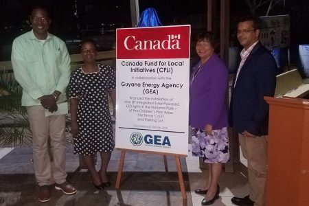 From left: Mark Lewis, Security Manager; Denise Bentinck, Deputy Commissioner of the Protected Areas Commission; Lilian Chaterjee, High Commissioner of Canada to Guyana; and Dr Mahender Sharma, CEO of the Guyana Energy Agency, stand with the plaque which was unveiled at the commissioning ceremony on Friday. 