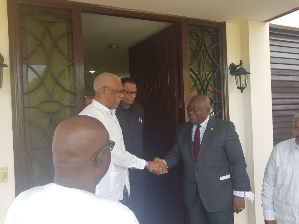 President David Granger is seen receiving President Nana Akufo-Addo (at right). (Guyana Embassy in Cuba photo) 

