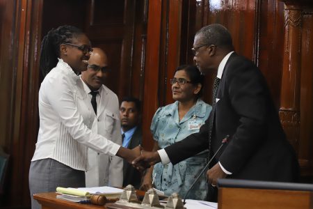 New Member of Parliament and Minister of Public Affairs designate Tabitha Sarabo-Halley is congratulated by House Speaker Dr. Barton Scotland after her swearing in yesterday at the Public Buildings. (Photo by Terrence Thompson)