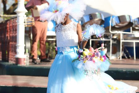 Making a wave:
Nine-year-old Janae Joseph gracing the stage with
her ‘Ocean Waves’ hat
during the Junior Elegant category of the Inner Wheel Club’s annual
hat competition at the Promenade Gardens
in Georgetown yesterday.
(Terrence Thompson photo)

