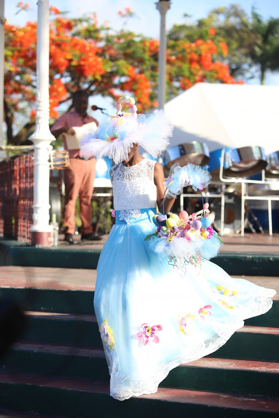 Making a wave:
Nine-year-old Janae Joseph gracing the stage with 
her ‘Ocean Waves’ hat 
during the Junior Elegant category of the Inner Wheel Club’s annual 
hat competition at the Promenade Gardens 
in Georgetown yesterday.  
(Terrence Thompson photo)
