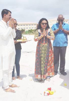 President of the Guyana Hindu Dharmic Sabha, Dr. Vindhya Persaud, (second from right) participating in the blessing of the site where the school will be constructed.