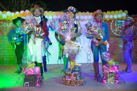 From left are first runner-up Faylaika Charles, Miss Rupununi Rodeo 2019 Mae Allicock and second runner-up Pricilla La Cruz. (Department of Public Information photo)
