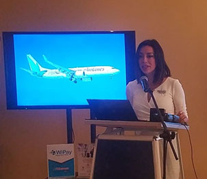 WiPay COO, Sasha Thompson, speaking at the press conference held yesterday at the Ramada Princess Hotel
