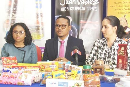 From left are Tiffany Aaron, Brand Representative; Mark Murray, Corporate Communications Officer;  Anjeta Hinds, Business Unit Head of AMTL Food and Consumer Goods Division