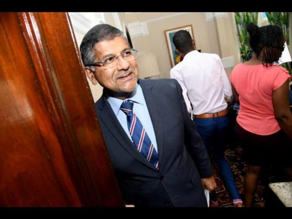 Asif Ahmad, British high commissioner to Jamaica and The Bahamas, attends a press briefing on the Windrush Compensation Scheme announced by the United Kingdom home secretary on Wednesday.
