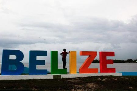 People gather on a touristic boardwalk in Belize City, Belize June 22, 2016. REUTERS/Jose Cabezas
