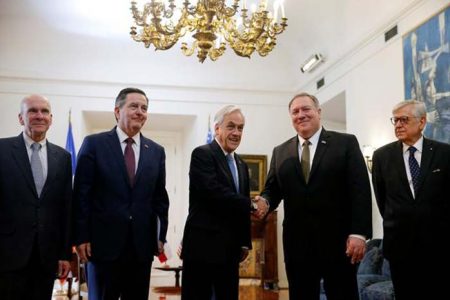 Mike Pompeo (second from right) shaking hands with Chilean President Sebastián Piñera