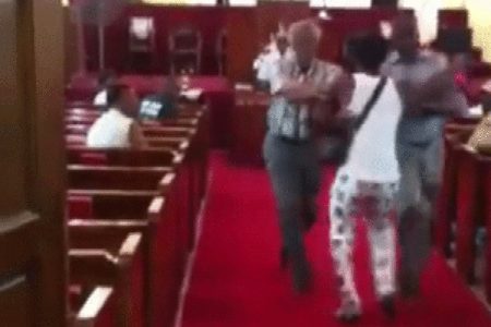 A still taken from the video showing the man being ousted from Emmanuel Baptist Church. (GP)