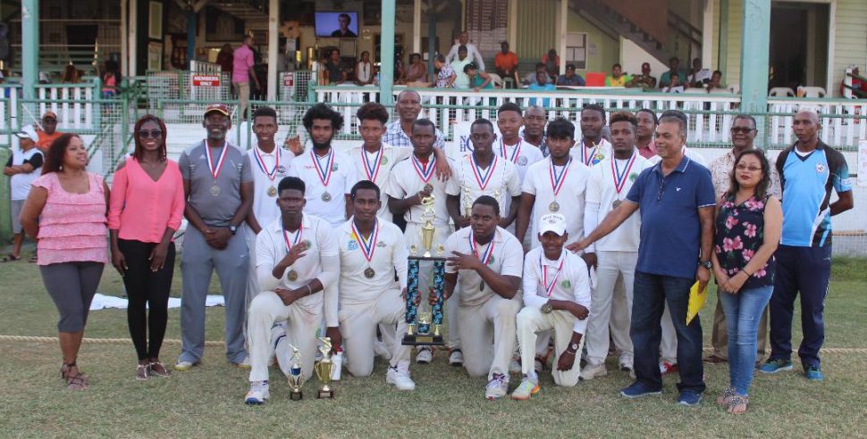 DCC pose with the championship cup after scampering past GCC in an exciting low-scoring affair (Royston Alkins photo) 
