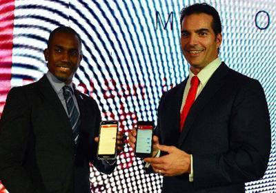 DIGITAL LAUNCH: Scotiabank managing director Stephen Bagnarol, right, and Damian Jones, general manager Corporate & Commercial Banking, Corporate Banking Centre, at the launch of Scotiabank’s Digital Banking platform at a cocktail event at Hyatt Regency Trinidad on Wednesday night.