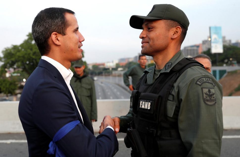 Venezuela’s Guaido (left) says troops have joined him to end Maduro presidency – Reuters
