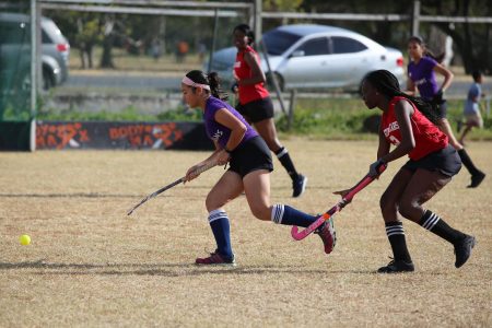 Hikers defender Rene Edwards takes evasive action to avoid the shot of GCC’s Lennox Carrol.