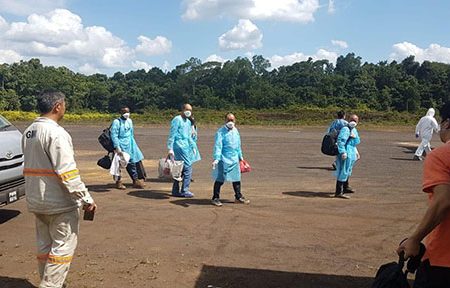 Employees of Guyana Manganese Inc on their way to board the Roraima Airways Flight from Matthews Ridge to the Eugene F Correia Airport yesterday. (Photo from Captain Gerry Gouveia’s Facebook page)