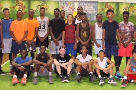 Some of Guyana’s top junior basketball players at yesterday’s session with Coach Rich Mahler and former NBA player Jermaine Taylor