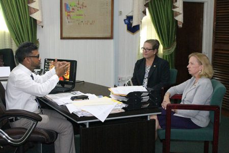 Mayor of Georgetown, Ubraj Narine (left) in discussion with US Ambassador Sarah-Ann Lynch (right)
