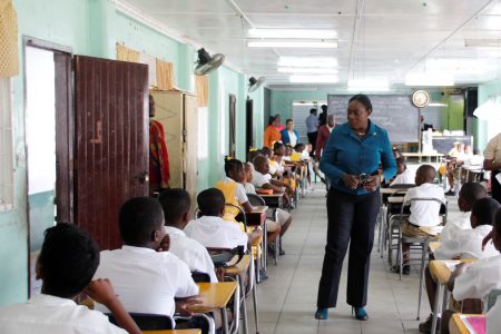 Minister of Education,  Nicolette Henry encouraging the students of St. Gabriel’s Primary School (Ministry of Education photo)
