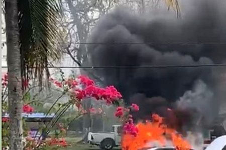 A White Axio sedan on fire in Gasparillo in early March.