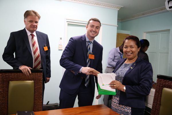 Minister of State, Dawn Hastings-Williams (right) along with representatives of Petrobras (DPI photo)  