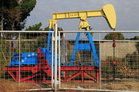 An oil pumpjack painted with the colors of the Venezuelan flag is seen in Lagunillas, Venezuela January 29, 2019. REUTERS/Isaac