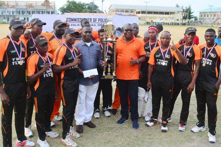‘F’ Division receives their maiden Police Commissioner’s Inter-Division T20 title from Police Commissioner, Leslie James (Orlando Charles photo)