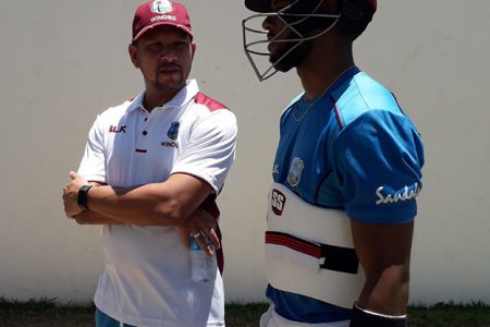 Ramnaresh Sarwan (left) chats with Shai Hope during the training camp at 3W’s Oval, UWI Cave Hill Campus. (Photo courtesy CWI Media) 