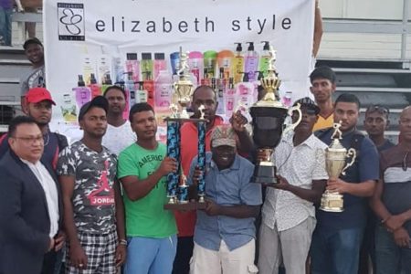 All Smiles! The ECCB and teams pose with the prizes as the ECCB/Elizabeth Styles 40-over tournament was unveiled on Saturday
