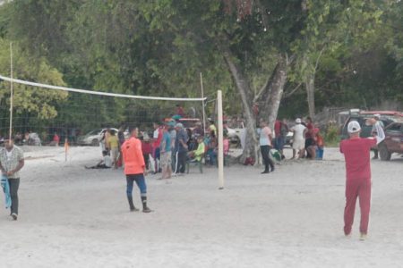 Two teams compete in a game of volleyball after the commissioning ceremony