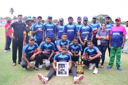 Amreith Rai (Rocky) Memorial T20 champs Zeeburg pose for a photo after defeating Rising Star on Wednesday.
