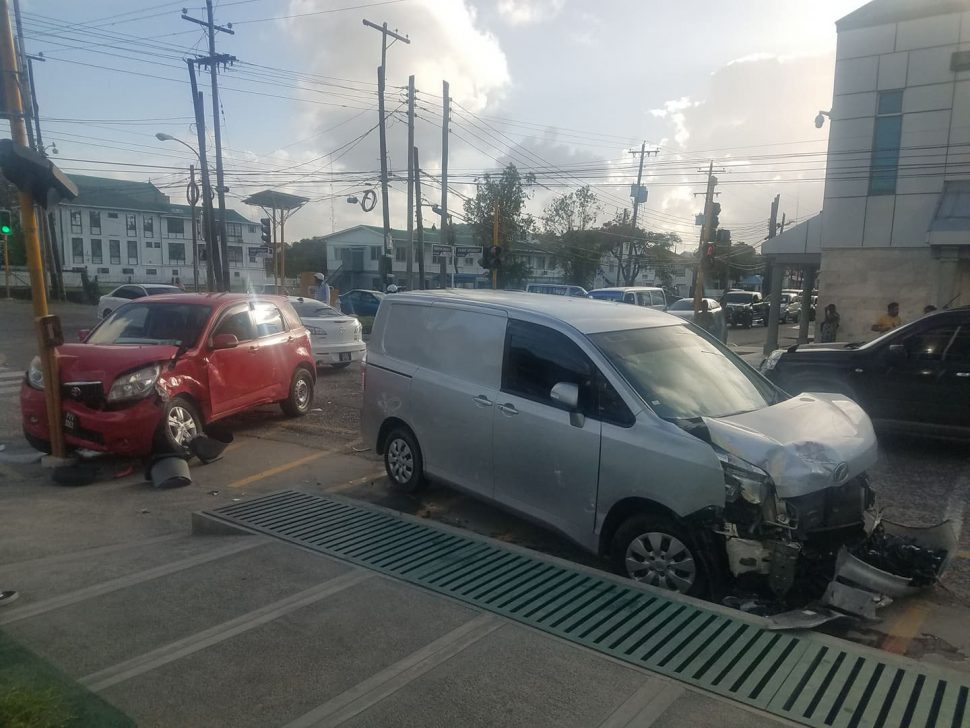 A collision occurred at around 4.30pm yesterday at the intersection of Camp Street and South Road. The driver of the red Toyota SUV PVV 9263 was heading north along Camp Street when the driver of the unregistered silver vehicle was proceeding east along South Road where he allegedly ran the red light which resulted in the collision. The drivers of the  vehicles did not sustain any major injuries, however, a traffic light at the intersection was damaged.  Police officers were on the scene just minutes after the accident. 
