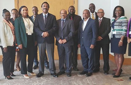 Attorney General and Minister of Legal Affairs, Basil Williams SC (sixth from left) with the team in Trinidad.
