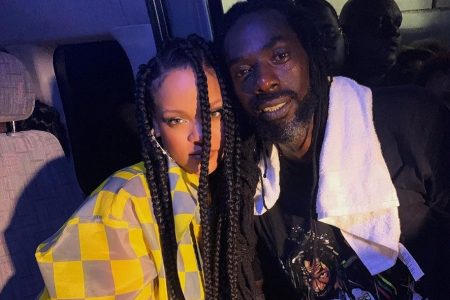 Buju Banton shares a moment with Rihanna following his performance in Barbados on April 27. 
