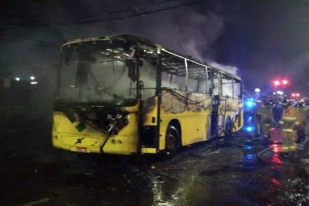 The Jamaica Urban Transit Company bus which caught fire in Halfway Tree, St Andrew last night 