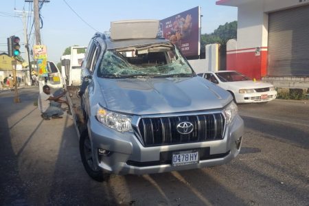 Security Minister, Dr Horace Chang's official vehicle somewhat smashed up after a collision at the intersection of Grants Pen Road and Shortwood Road in St Andrew on Wednesday morning.(Photos: Marlon Reid) 