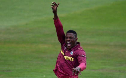 Fast bowler Sheldon Cottrell celebrates after taking a wicket during the ongoing World Cup.
