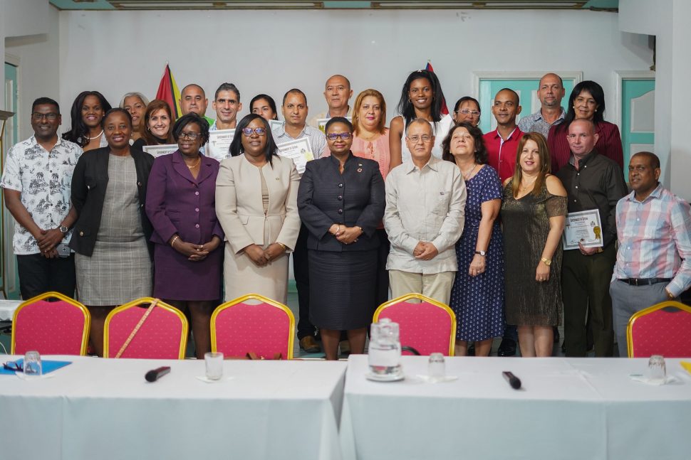 The Cuban medical brigade with government officials and others (DPI photo)
