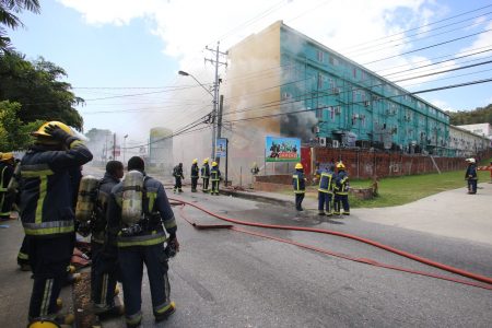 Flashback: February 2015 firefighters at the scence of the incident at El Pecos resturant in Maraval.