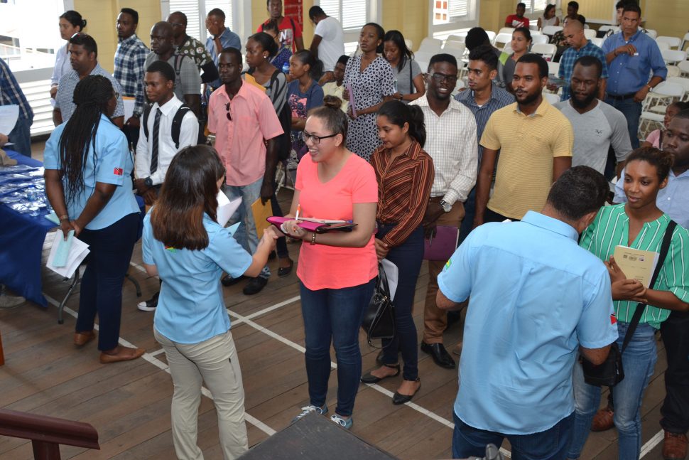 Some of the dozens of Guyanese who turned up seeking jobs with oil and gas company Schlumberger. (DPI photo)