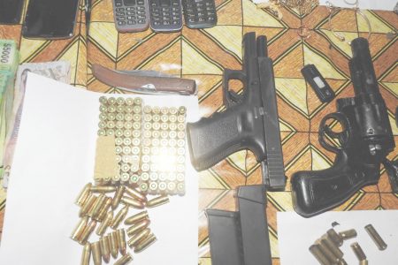 The guns and ammunition recovered (Police photo)