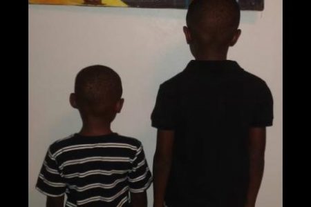 JahDore’s four-year-old and eight-year-old Rastafarian sons who he alleges were given a haircut after policemen removed them from their home last week.