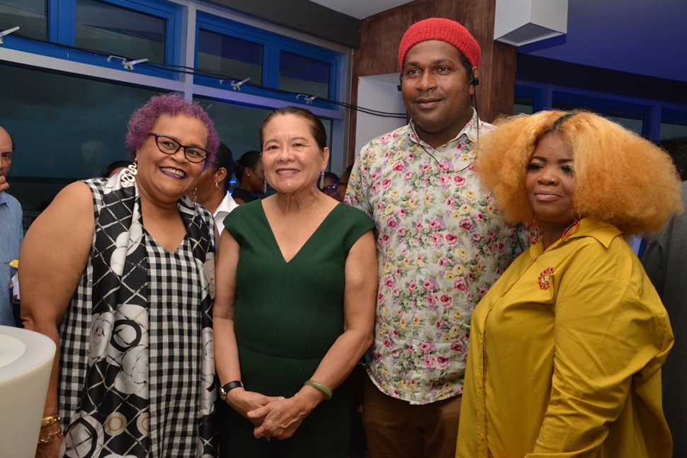 International Day against Homophobia: First Lady, Sandra Granger (second from left), Artistes in Direct Support Executive Director, Desiree Edghill (left) and other attendees at the Commemoration of the International Day against Homophobia, Transphobia and Biphobia (IDAHOBT) event held at the Aura Lounge, Pegasus Hotel yesterday. The event was held by the US Embassy. (Ministry of the Presidency photo)