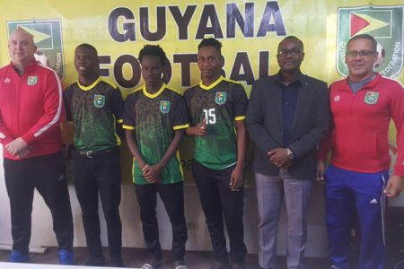 GFF President Wayne Forde (2nd right) pictured with the players and other officials from right, Toledo Wilson (Director of Coaches Education), Ryan Hackett, Kelsey Benjamin, Ryan Hackett and GFF Technical Director, Ian Greenwood
