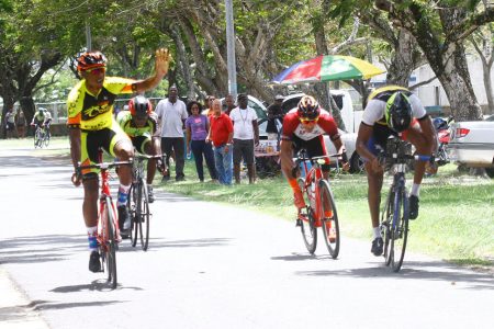 Jamual John bested breakaway mates Michael Anthony, Paul DeNobrega and Adelie Hodge to win the feature 35-lap event of the second annual Rainforest Water multi race programme which was staged yesterday at the National Park. (Orlando Charles photo)