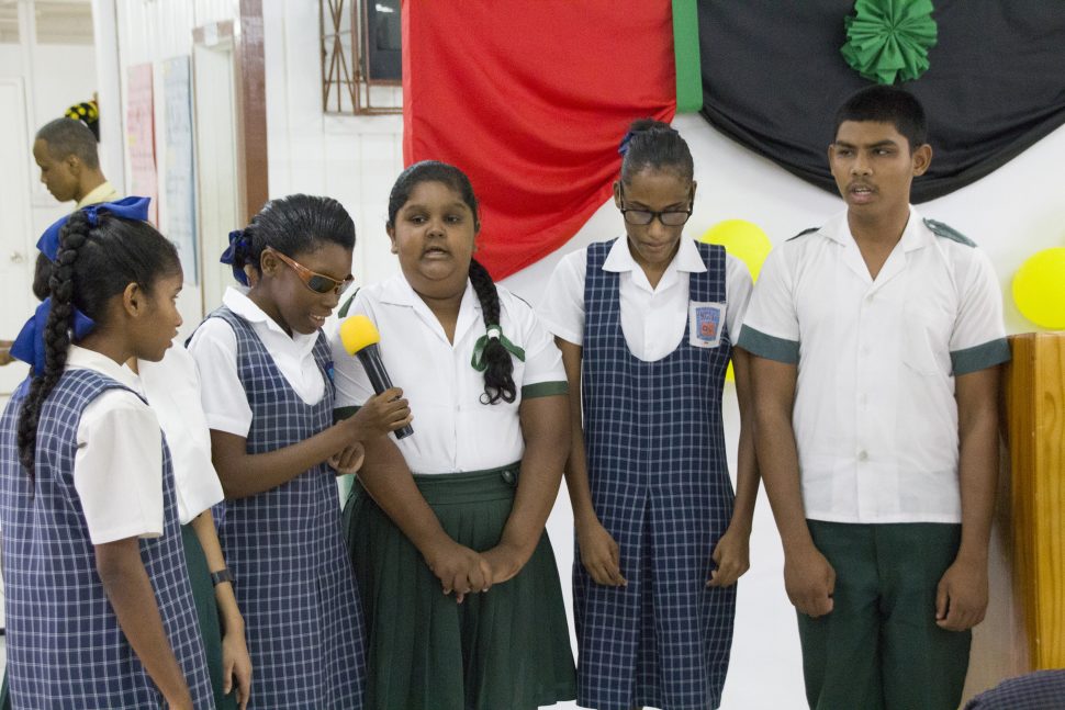 Students attached to the Unit singing national songs at yesterday’s event (Ministry of Education photo)

