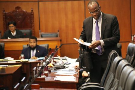 Opposition Senator Taharqa Obika leaves the chamber after he was told to leave by President of the Senate, Christine Kangaloo during the sitting of Senate.