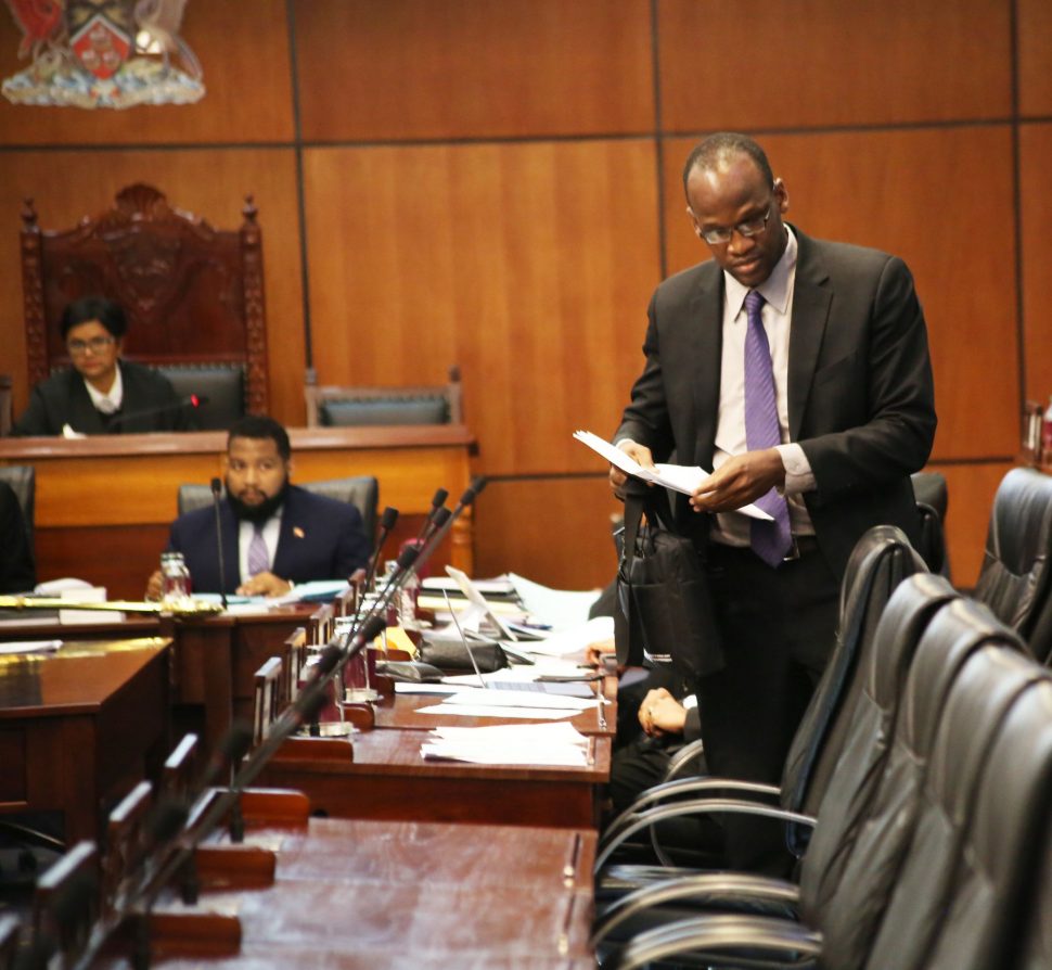 Opposition Senator Taharqa Obika leaves the chamber after he was told to leave by President of the Senate, Christine Kangaloo during the sitting of Senate.